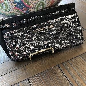Victoria’s Secret gold and black sequined clutch